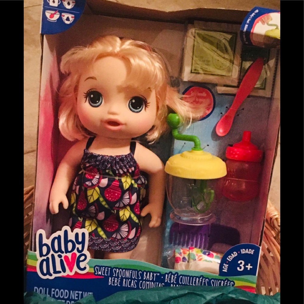 Baby Alive with accessories, excludes the basket